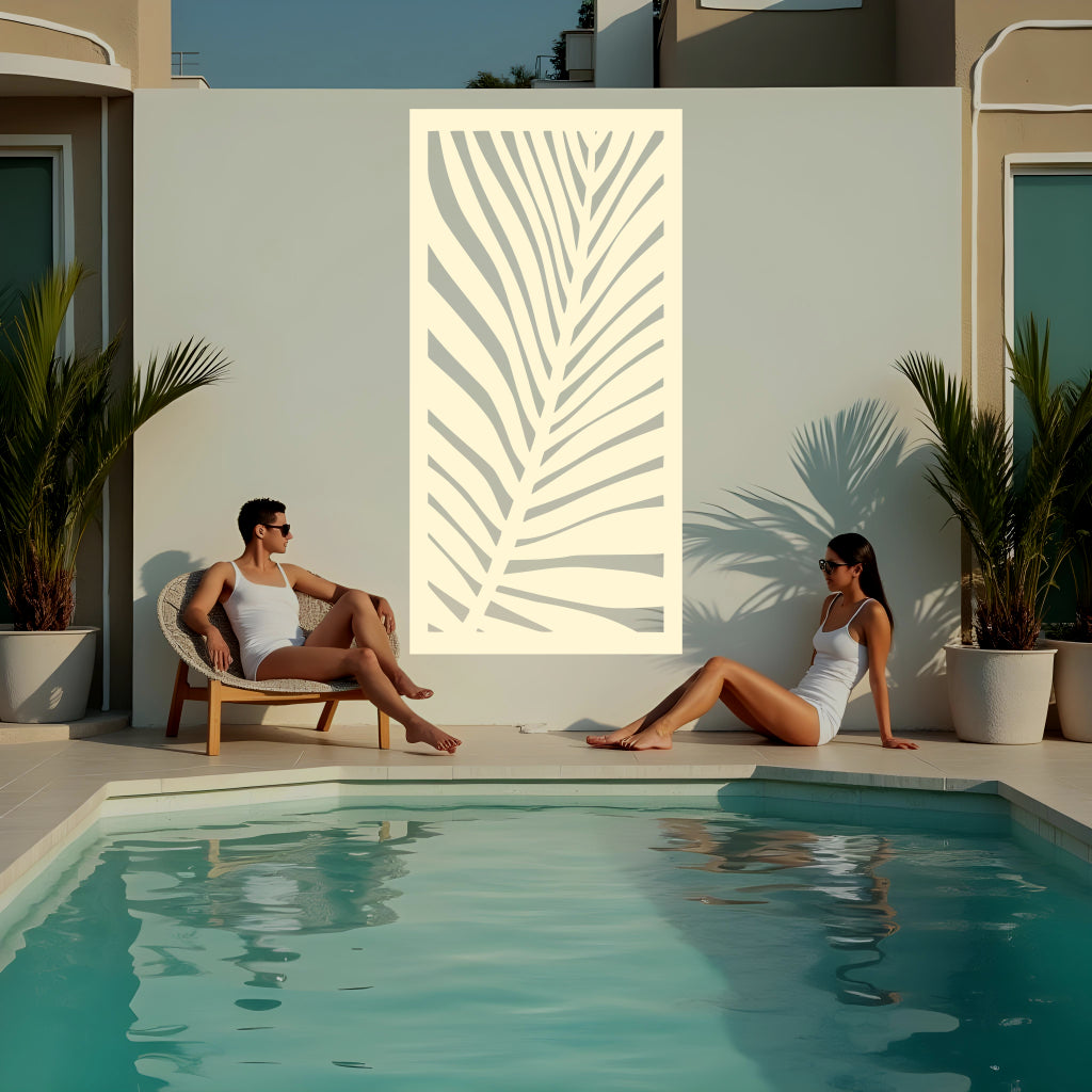 Palm Leaf privacy screen in Canola Cream, blending soft yellow tones with a striking palm leaf pattern, perfect for creating a warm, inviting outdoor ambiance.
