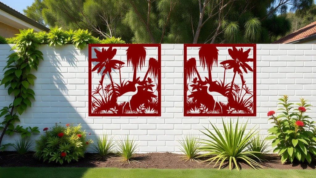Bold Wetlands wall art panels in Manor Red, featuring tropical plants and herons, creating a striking accent for outdoor walls or fences.