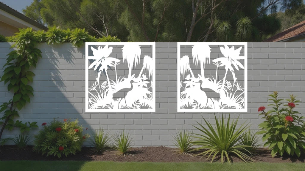 Elegant Wetlands metal wall art panels in Bright White Gloss, featuring detailed tropical plants and herons, ideal for modern and refreshing outdoor décor.